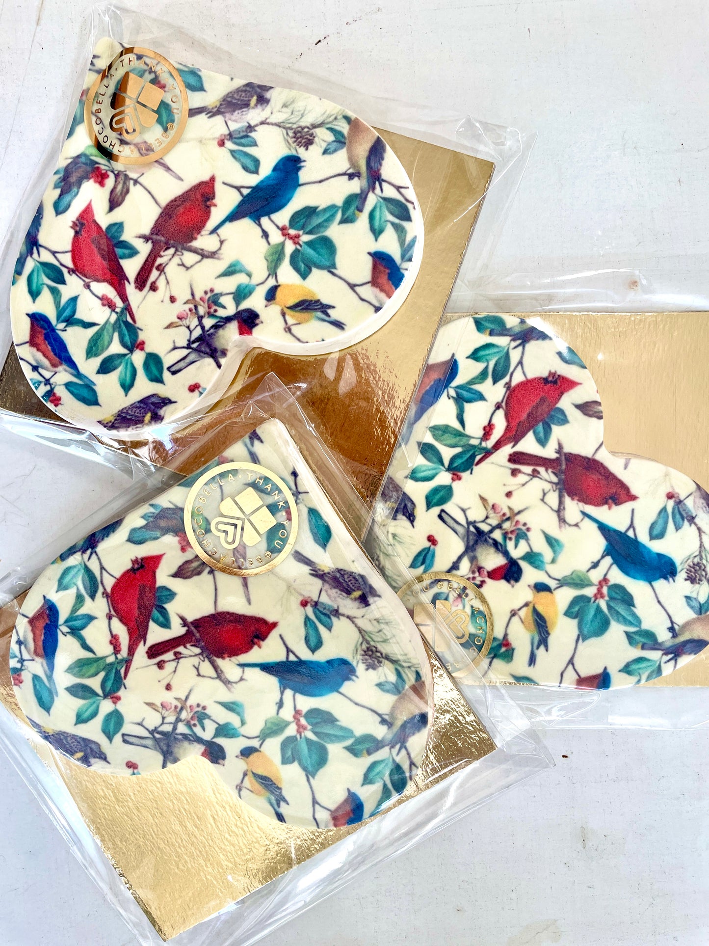 White chocolate heart-shaped bar with birds pattern