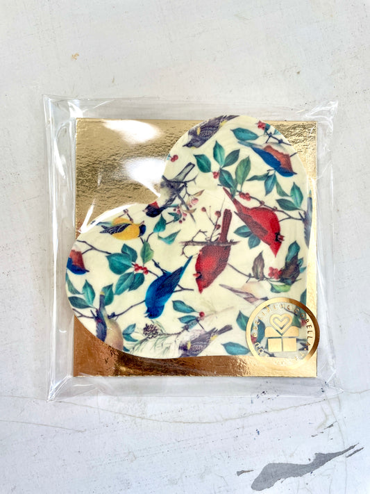 White chocolate heart-shaped bar with birds pattern